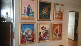 A few framed Classics Illustrated cover paintings.