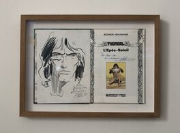 Encadrement d'art - musée conservant l'oeuvre et son album dans un coffret creusé, avec un double vitrage d'on l'un pour mise à plat de l'image et présentation optimale Encadrement d'art - musée conservant l'oeuvre et son album dans un coffret creusé, avec un double vitrage d'on l'un pour mise à plat de l'image et présentation optimale