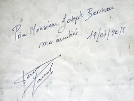 Signature et dédicace au dos de la planche