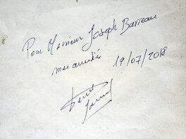 Signature et dédicae au dos de la planche