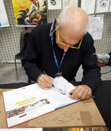 Rodolfo Torti en dédicace à ValEnBulles 2025.