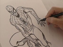 John Romita drawing this illustration John Romita drawing this illustration